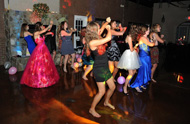 Birthday girl on dance floor with guests